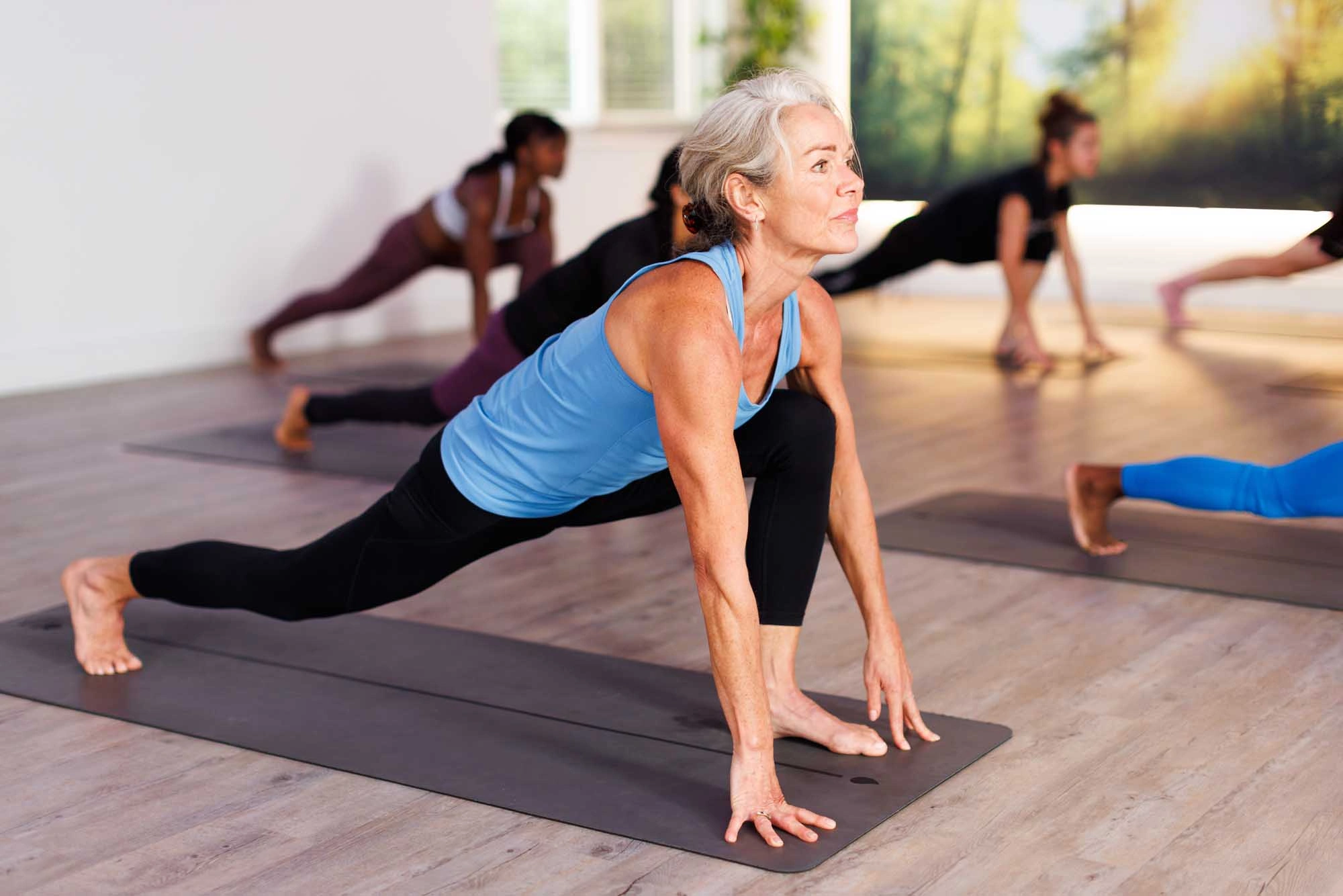 lady stretching on mat