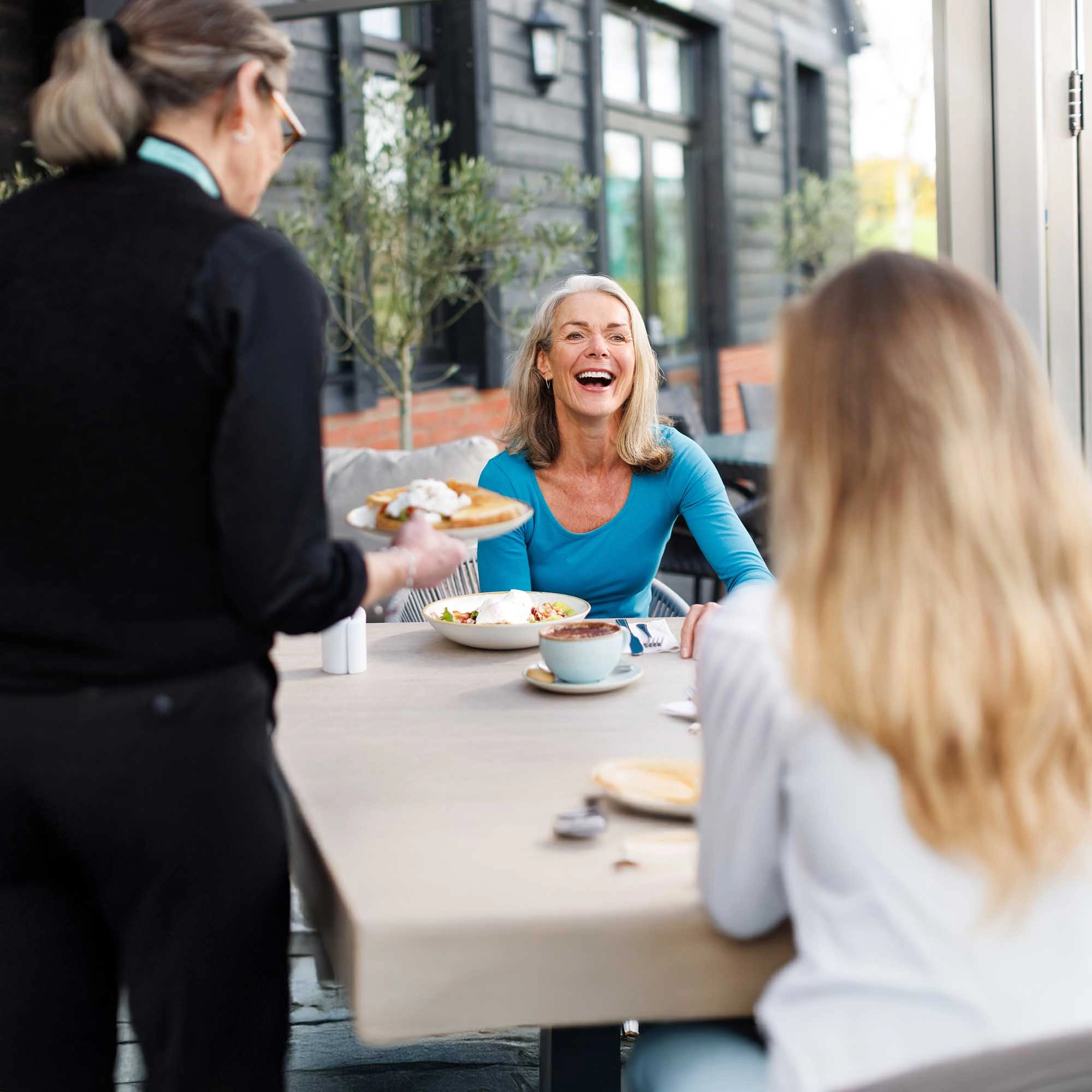 two ladies enjoying breakfast